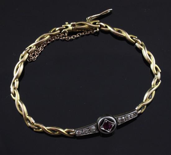 A 1940s 18ct gold, ruby and diamond bracelet, gross 13.5 grams.